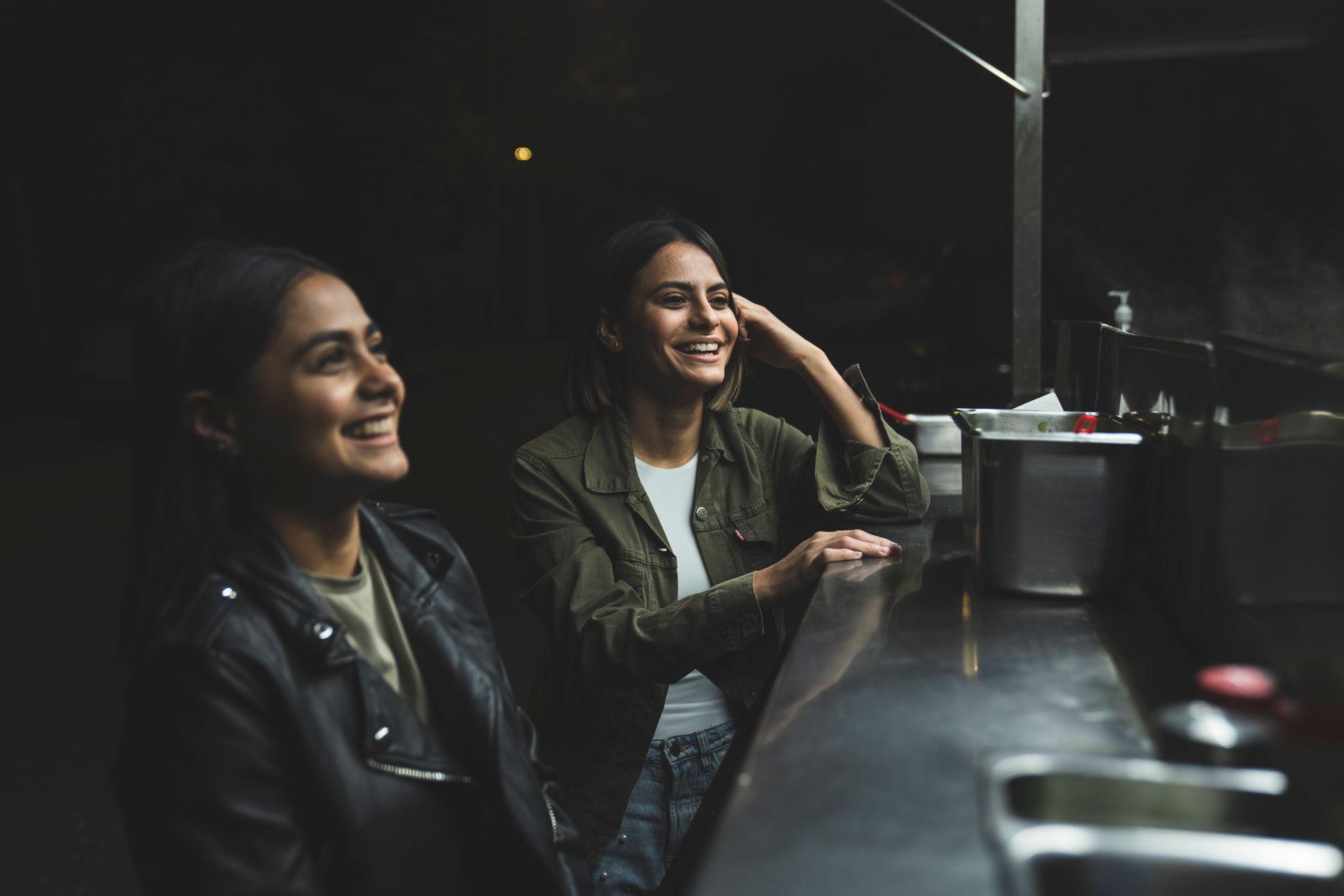 friends eating out on a winter night